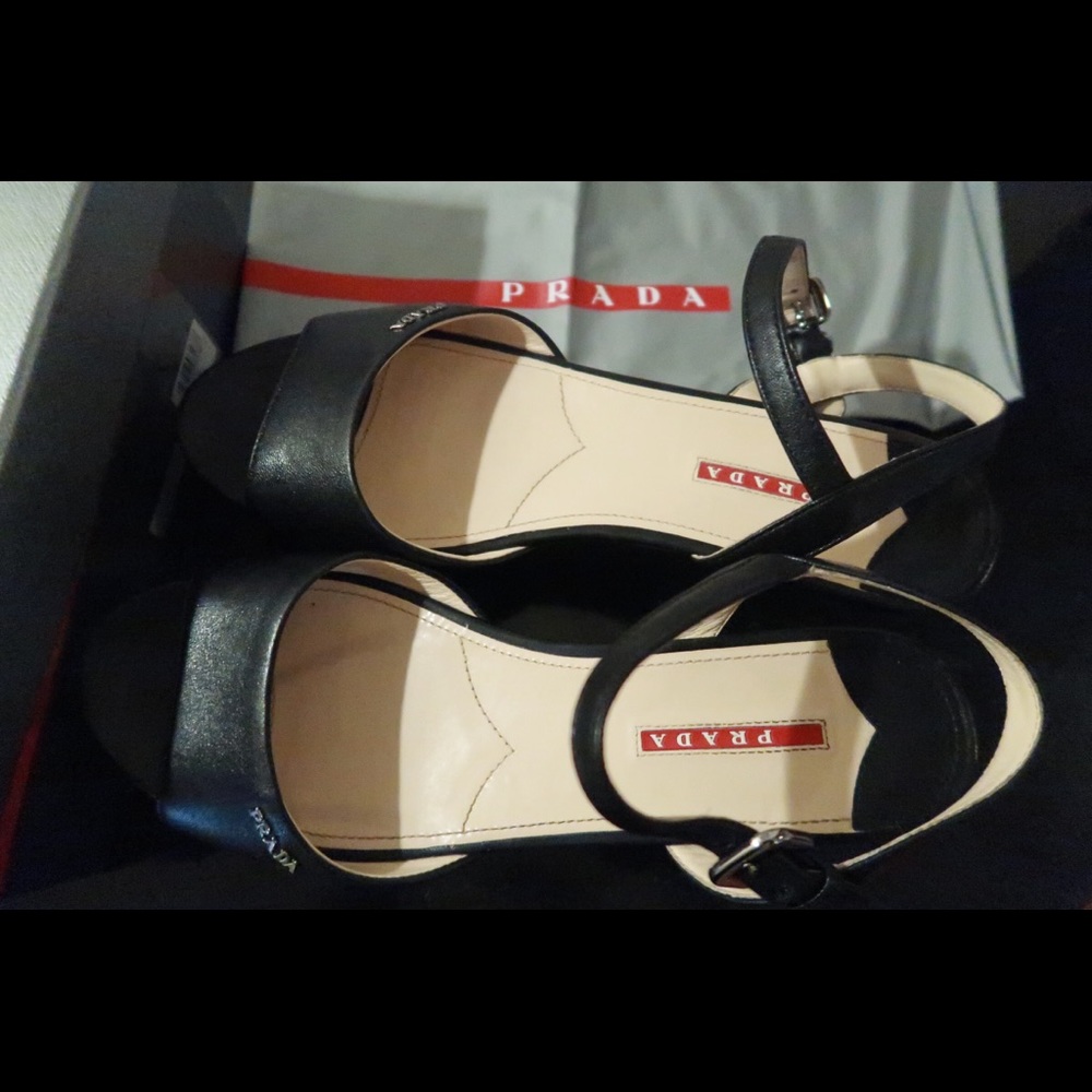 Black leather Prada platforms